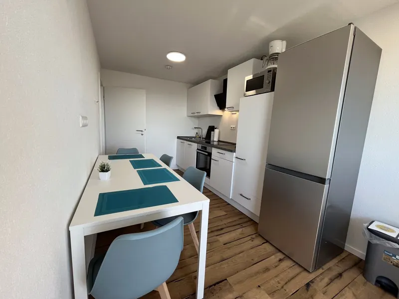 Wohnung, Foto 2: Küche mit Esstisch